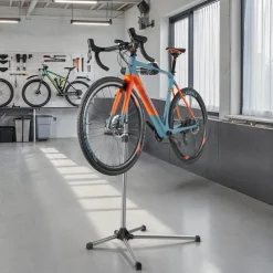 tectake® Fahrradmontageständer, für alle gängigen Modelle, lackschonend, inklusive Werkzeugablage mit Montageschlüssel